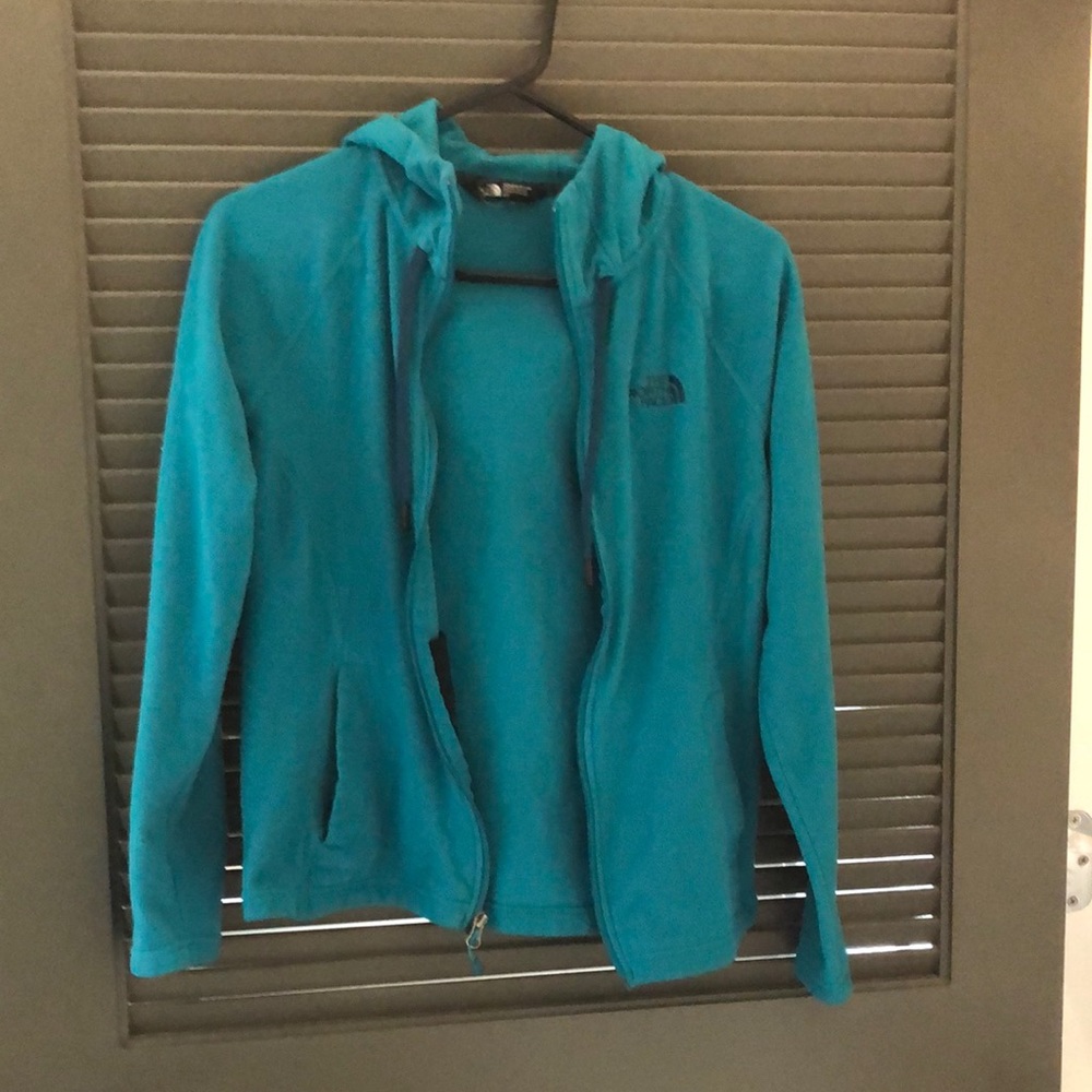 The north face aqua green zipper hoodie sweater women’s size small. Heavily worn